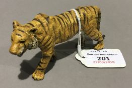 A cold painted bronze model of a tiger