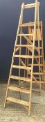 Two vintage wooden step ladders
