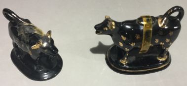 Two Victorian pottery cow creamers