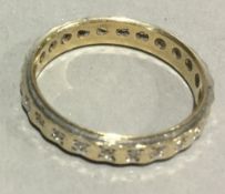 A 9 ct gold diamond full eternity ring