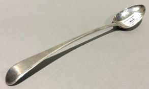 A Georgian silver stuffing spoon