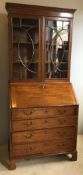 A George III mahogany bureau bookcase