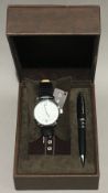 A boxed cross watch and pen set