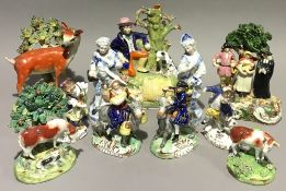 A quantity of Staffordshire and other figures