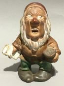 A painted terracotta gnome