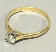 An 18 ct gold diamond set solitaire ring, approximately 0.25 carat (1 gramme).