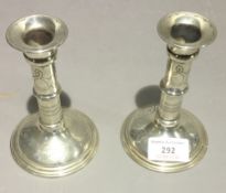 A pair of Scandinavian 900 silver candlesticks
