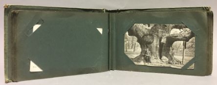 A postcard album containing postcards,