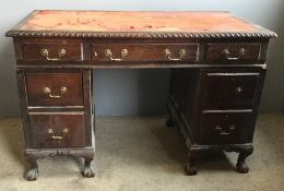 An early 20th century mahogany pedestal desk