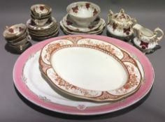 A Victorian porcelain tea service and two Victorian meat plates