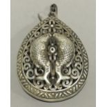 A Chinese pendant decorated with fish