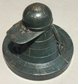 A Victorian painted carved wooden inkwell formed as a jockeys cap