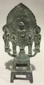 A small Oriental bronze five god shrine