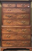 A George III mahogany chest on chest with a blushing slide