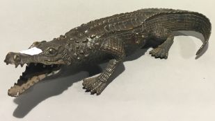 A bronze model of a crocodile