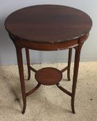 An Edwardian mahogany centre table