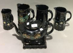 A quantity of Jackfield glaze ceramics