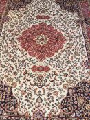 A biege ground Kashan carpet 2.3 x 1.