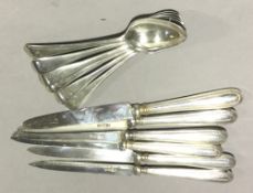 A set of six silver teaspoons and a set of silver handled knives