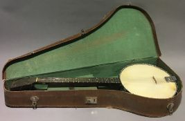 A Dallas four string banjo,