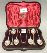 A set of six silver teaspoons and sugar nips en-suite, Birmingham 1901,