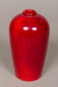 A Bernard Moore vase, with allover red glaze, signed to base. 13.5 cm high.