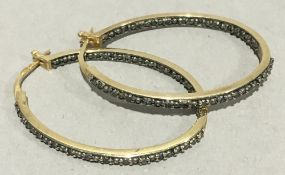 A pair of 9 ct gold and black diamond hoop earrings