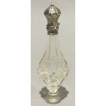 A French silver topped scent bottle