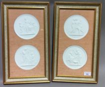 A pair of well framed and glazed plaster/porcelain classical roundels,
