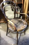 An early 20th century bentwood armchair