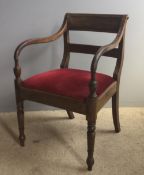 An early 19th century mahogany open armchair