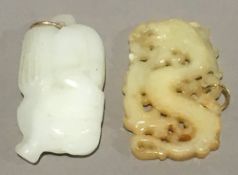 Two white jade pendants