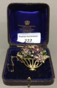 A tutti frutti flowering basket brooch