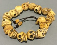 A bone bracelet carved with skulls