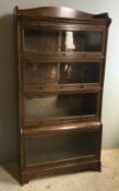 An oak Globe Wernicke type sectional bookcase with glazed doors