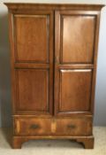 A walnut wardrobe,