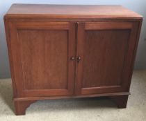 An Edwardian mahogany side cabinet