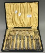 A cased silver handled fish set