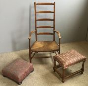 A rush seated ladder back chair and two foot stools