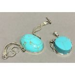 A silver turquoise bracelet,