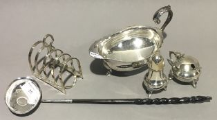 A coin set baleen handled toddy ladle and a small quantity of silver plate