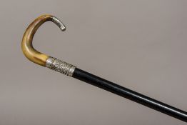 An Art Nouveau silver mounted horn handled stick