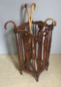A carved wooden stick stand