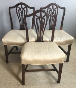 Three Victorian mahogany shield back dining chairs