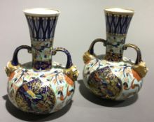 A pair of Derby vases