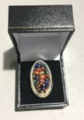 A silver and millefiori glass ring