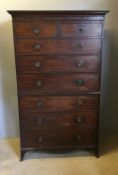 An early 19th century mahogany chest on chest