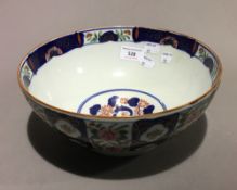 A porcelain bowl decorated in the Imari palette