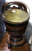 A 19th century Dutch wooden and brass coal bucket