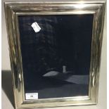 A hallmarked silver photo frame